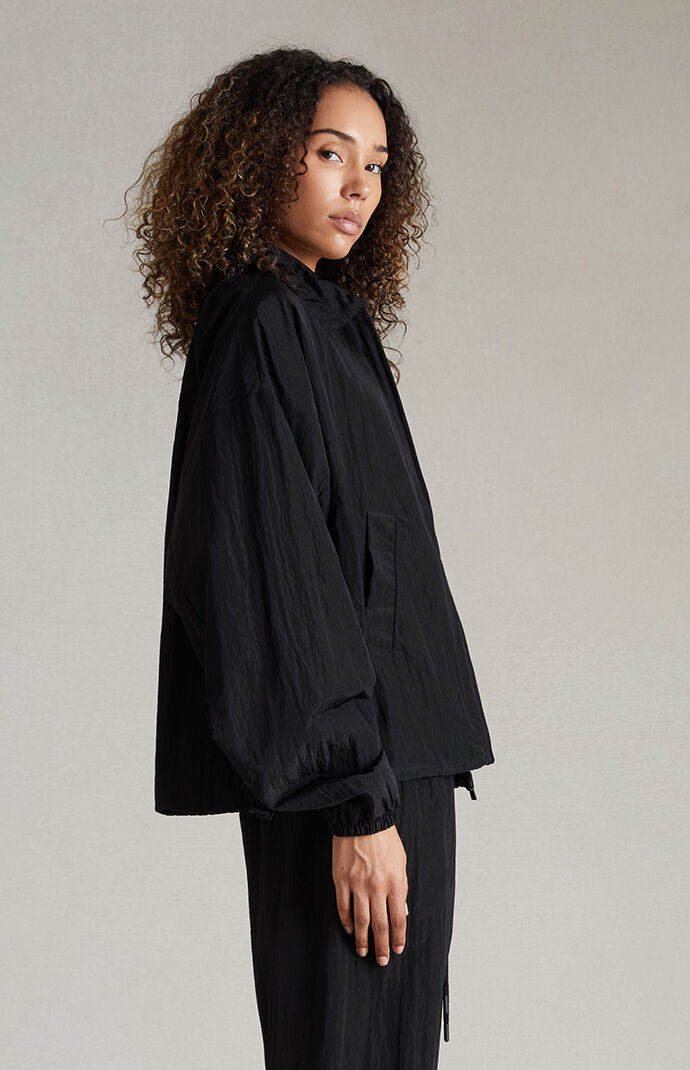 Fear of God Essentials Women s Jet Black Crinkle Nylon Shell Bomber Jacket PacSun