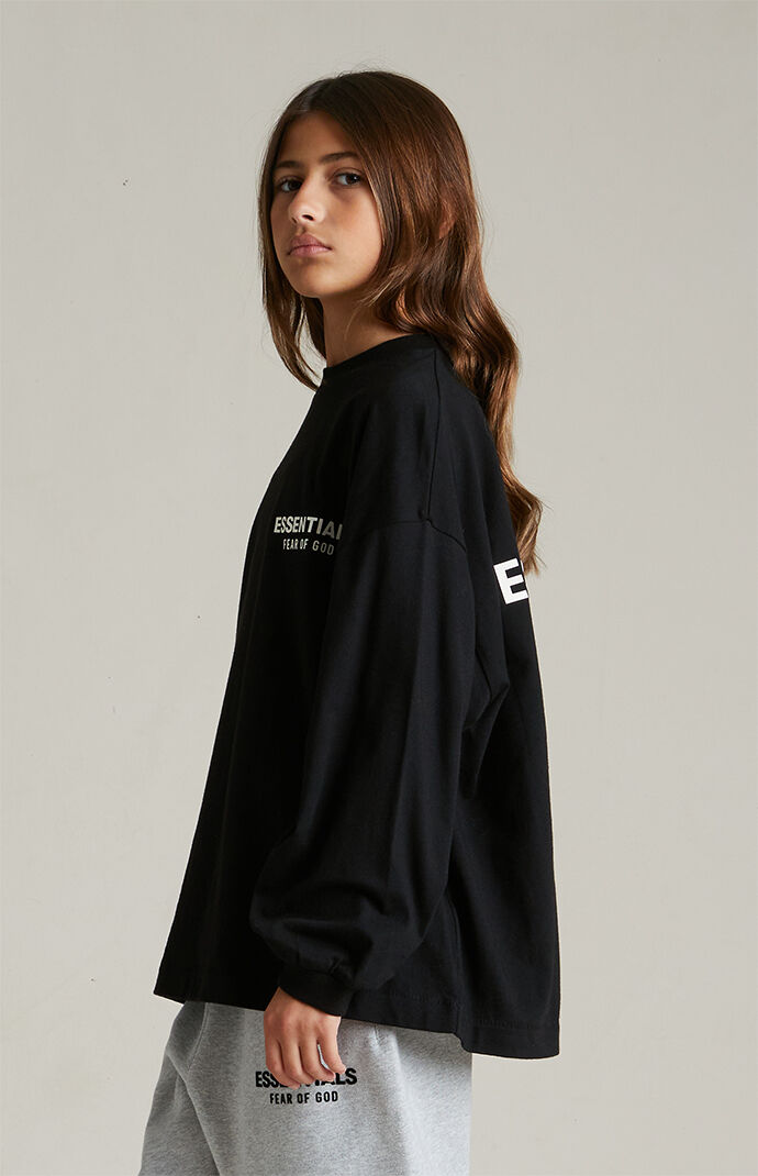 Fear of God Essentials Kids Black Long Sleeve T-Shirt | Pacsun