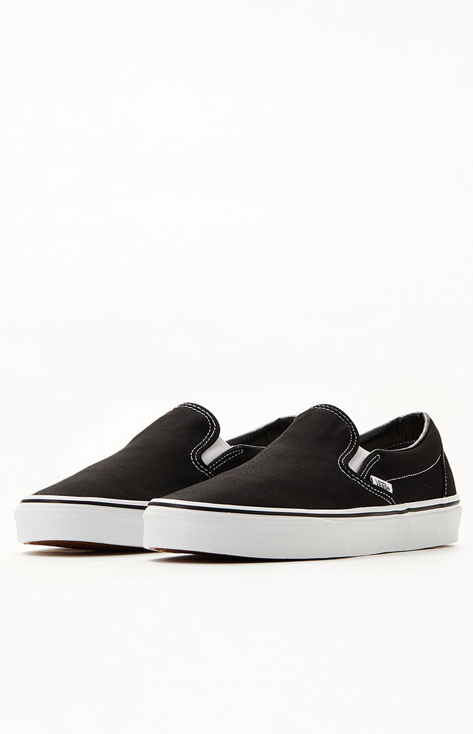 Vans slip on black sole online