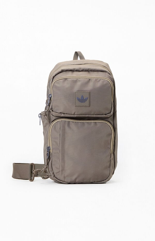 adidas canvas sling backpack Originals Utility Crossbody Bag with Water Bottle Sleeve Made with 100% recycled polyester adidas Originals Utility 3.0 sling
