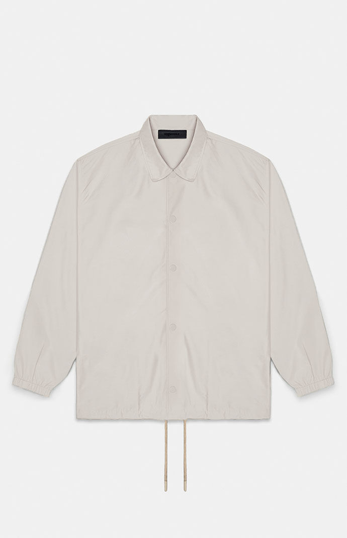 Fear of God Essentials Silver Cloud Coach Jacket | PacSun