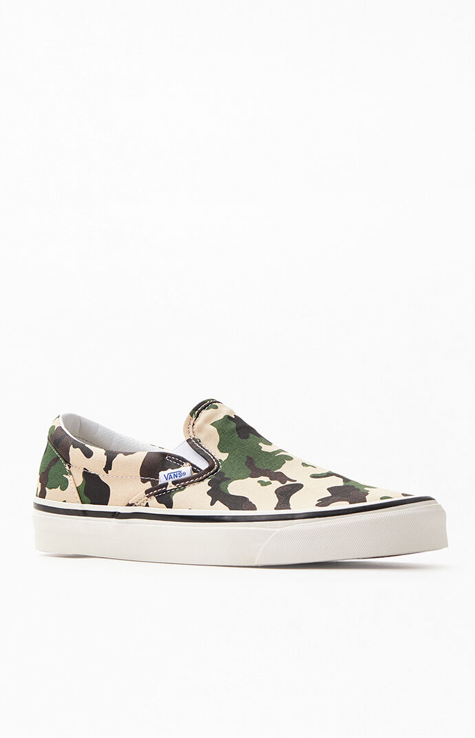 white camo vans slip on