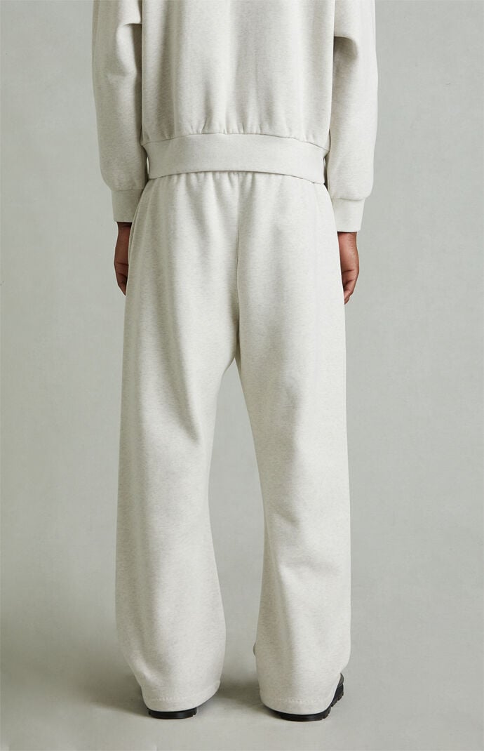 Fear of God ESSENTIALS Heather Oatmeal Fleece Flare Sweatpants