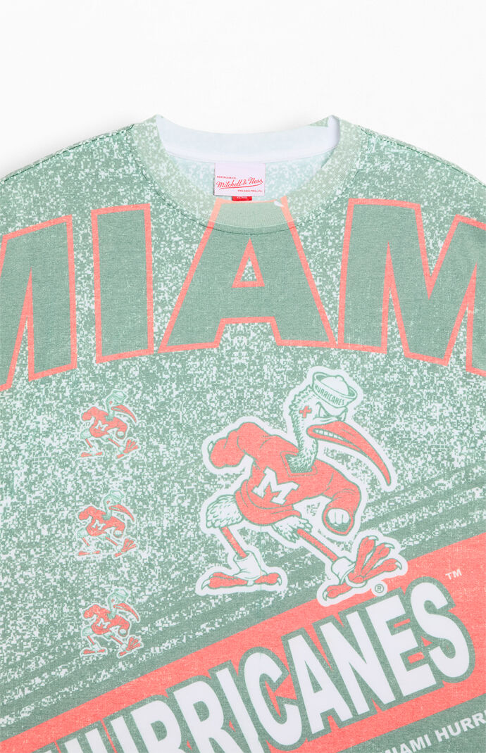 ★Mitchell & Ness NCAA Miami Hurricanes Playmaker 関税込★ Mitchell & Ness NCAA Miami Hurricanes Playmaker T-Shirt | PacSun