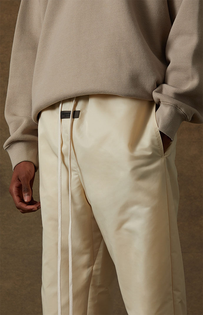 Fear of God Essentials Egg Shell Track Pants PacSun