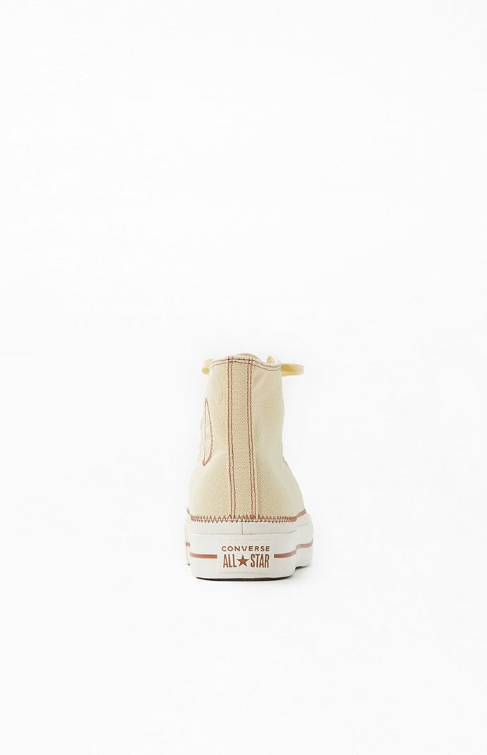 Womens cream converse high hot sale tops