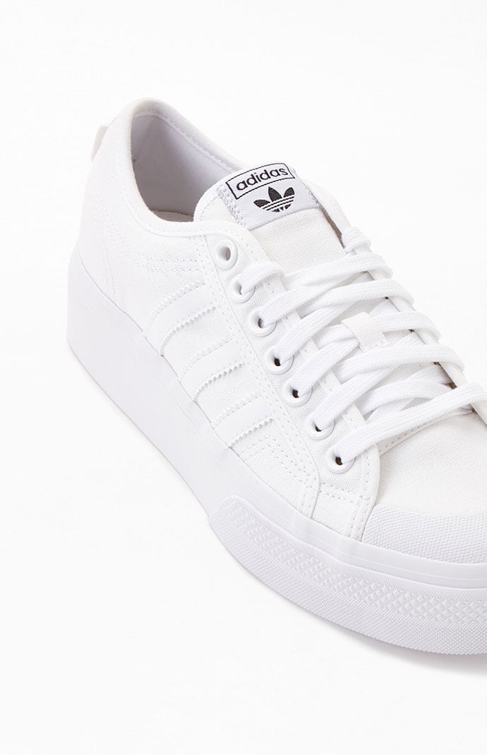 White platform sales sneakers adidas