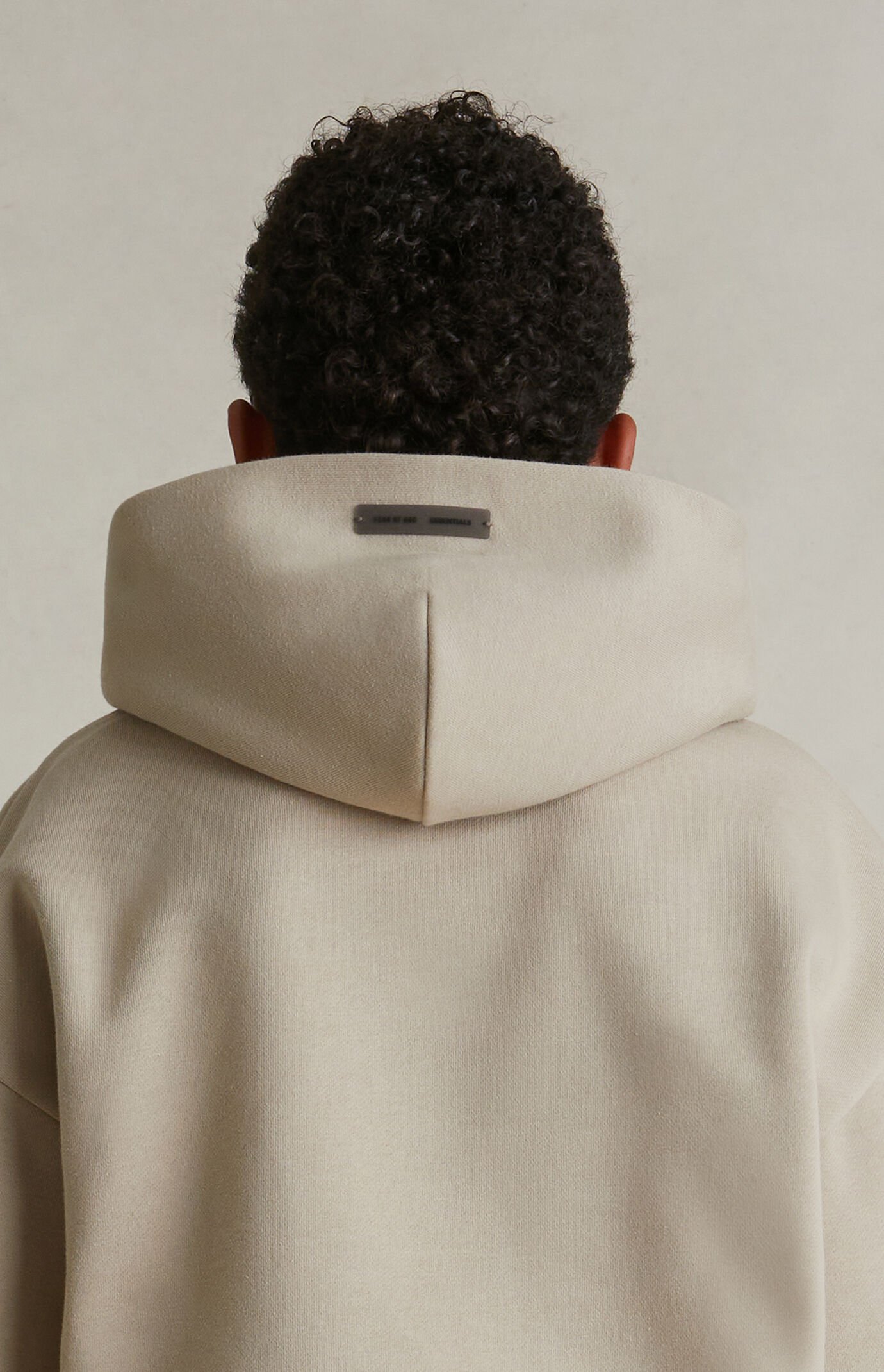 FEAR OF GOD ★【パーカー】Essentials Timber Classic Fleece Fear of God Essentials Kids Timber Fleece Hoodie | PacSun
