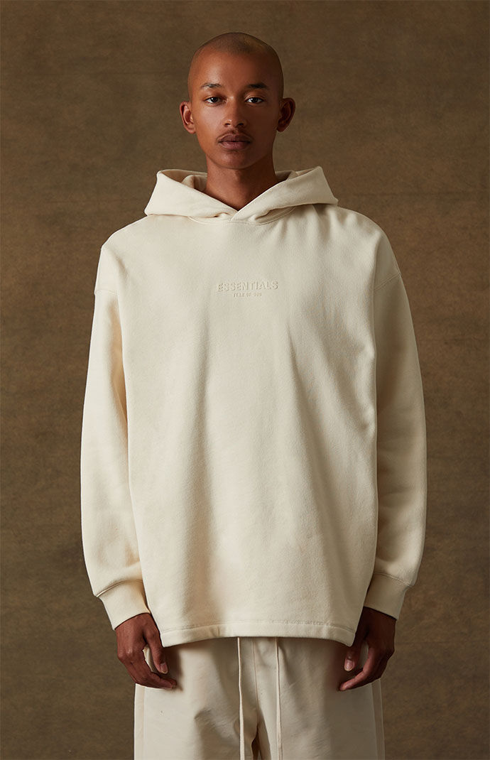 Fear of God Essentials Egg Shell Relaxed Hoodie | PacSun