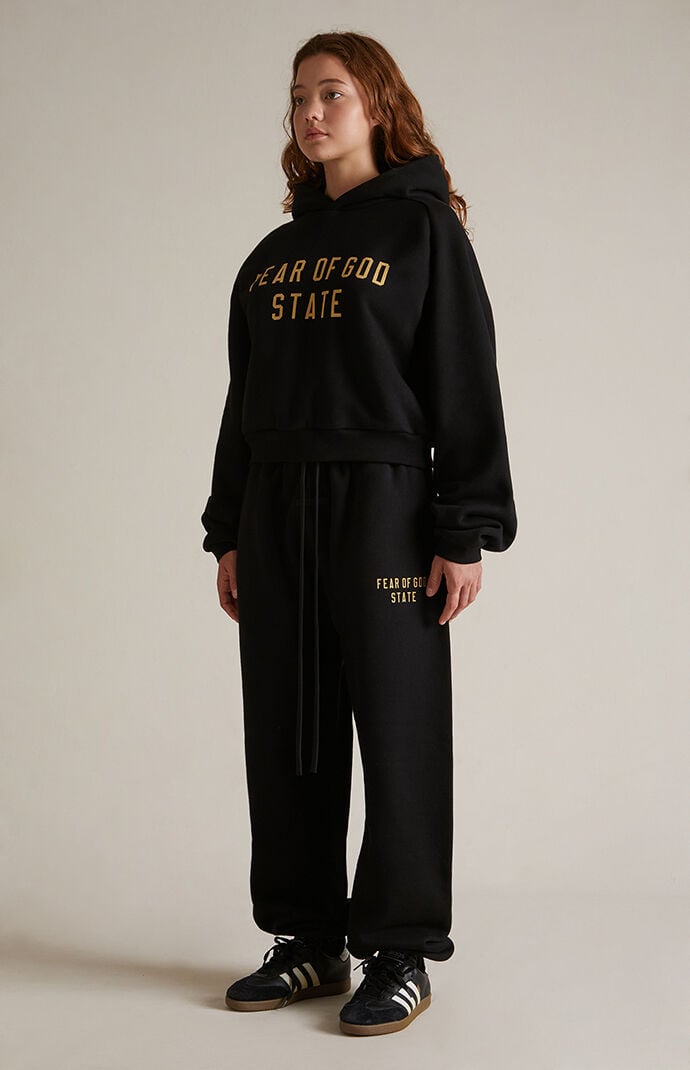 Fear of God Essentials Women s Black Fleece Cropped Hoodie PacSun