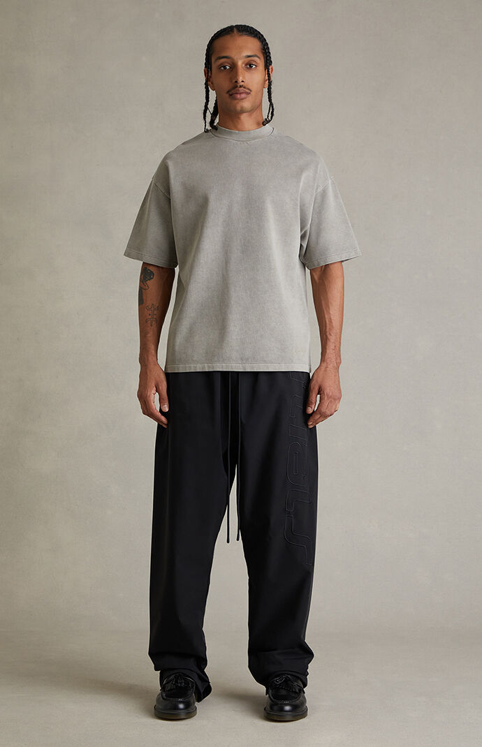 Fear of God ESSENTIALS Vintage Black Active Trace Baggy Track Pants