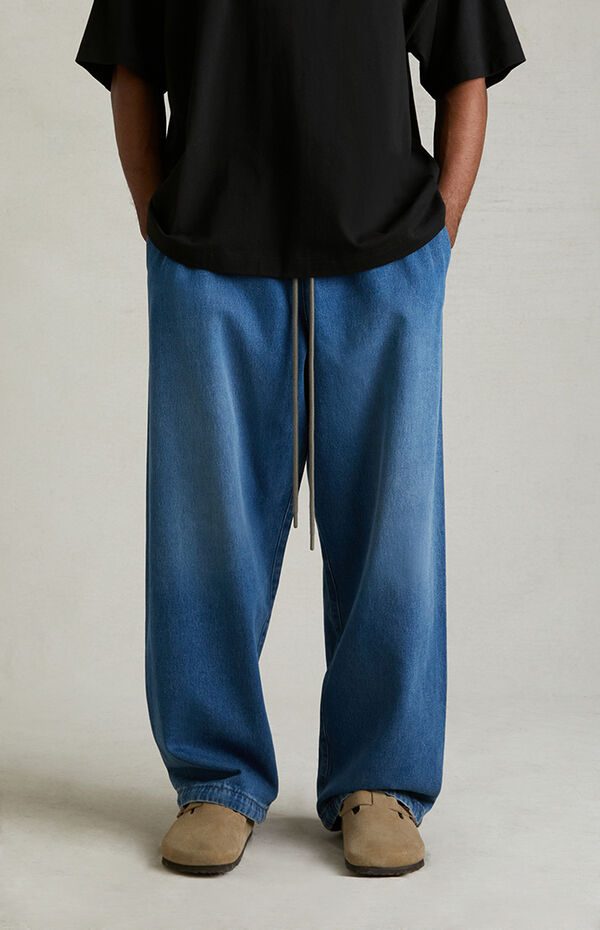 Fear of God Essentials Medium Wash Denim Lounge Pants | PacSun 
