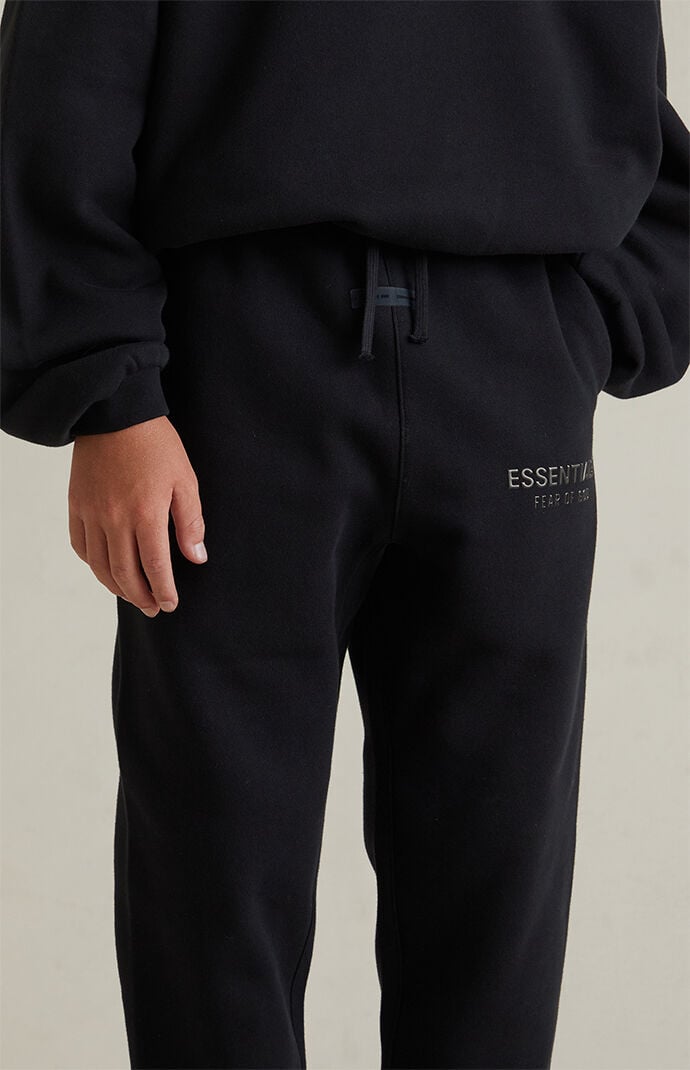 Fear of God ESSENTIALS Kids Jet Black Classic Sweatpants | Pacsun