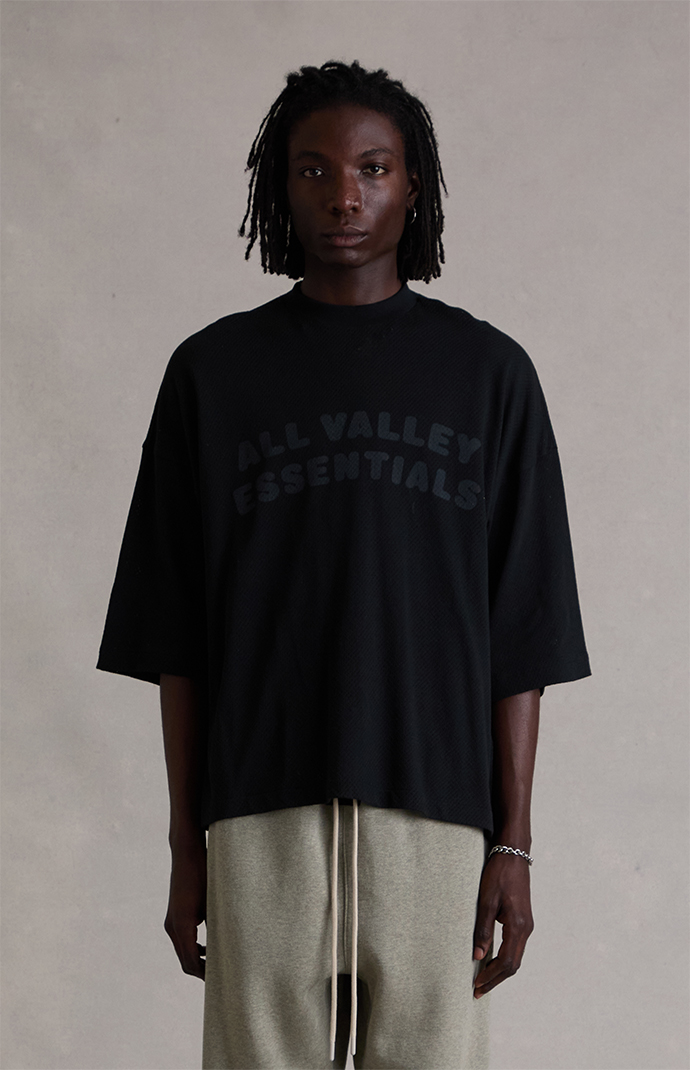 Fear of God ESSENTIALS Vintage Black Merch T-Shirt | Pacsun
