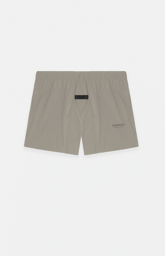 Kids Fear of God Essentials Dust Nylon Running Shorts | PacSun