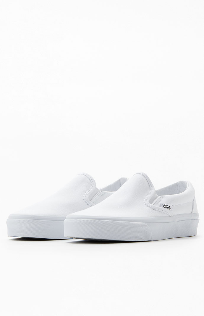 All white top slip on vans